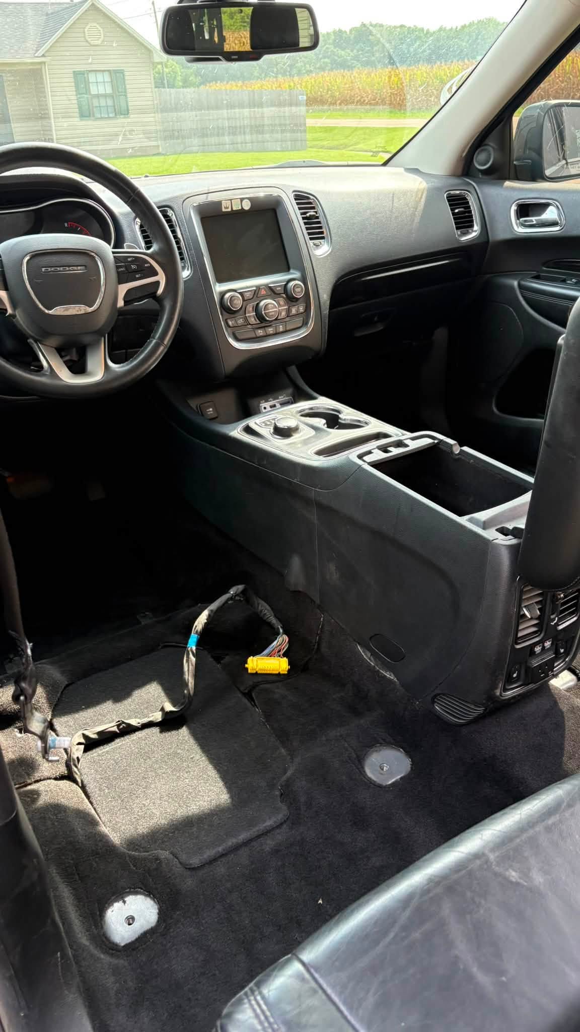 Front vehicle cabin with seats removed for deep cleaning